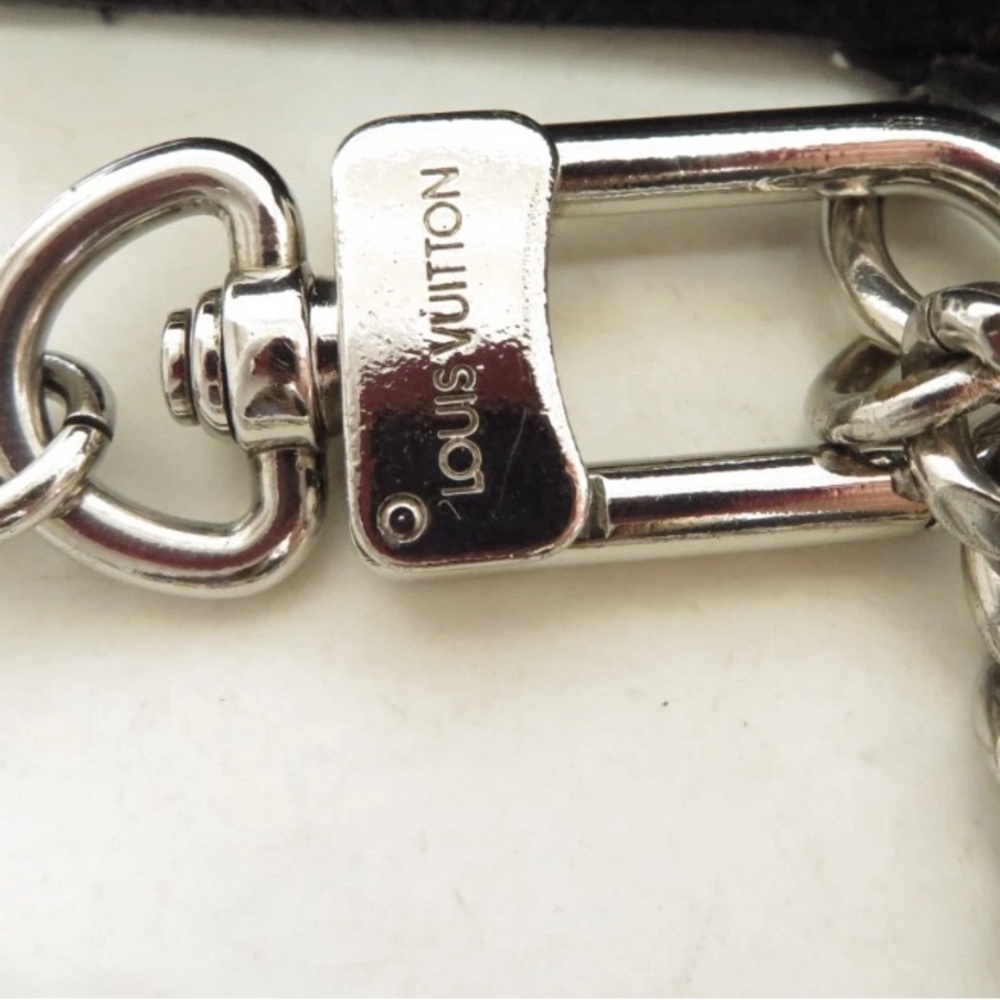Louis Vuitton silver tone wallet watch stainless chrome  signed chain only.